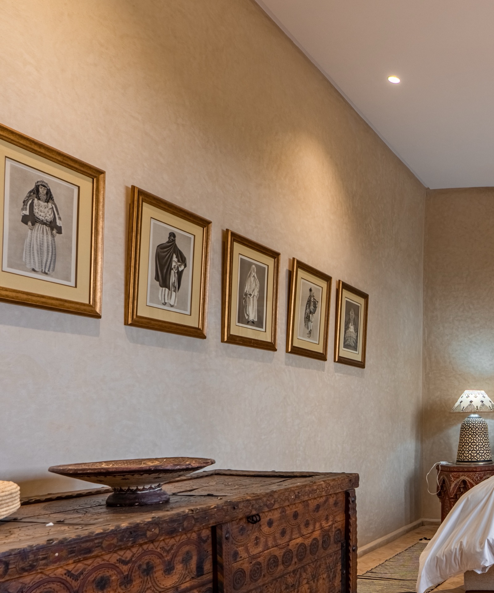 Framed Moroccan portraits in a suite